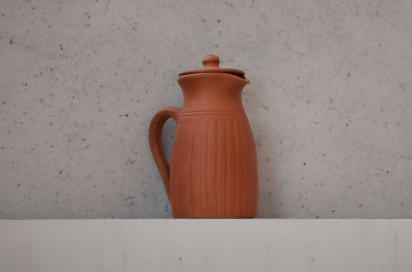 Handamde Terracotta Jug with Carving On All Sides | Verified Sustainable Glasses & Tumblers on Brown Living™