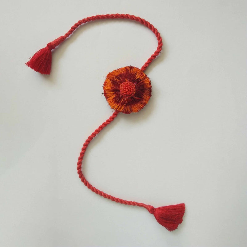 Buy Dual Avtar Ikat Rakhi - Red Orange | Reusable Ikat Rakhi | Shop Verified Sustainable Rakhi on Brown Living™