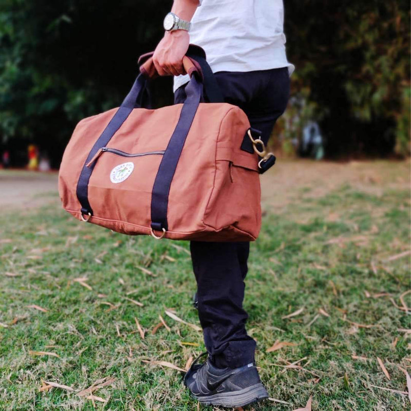 Buy Rhino Duffel - Cherry Red | Shop Verified Sustainable Travel Duffel on Brown Living™