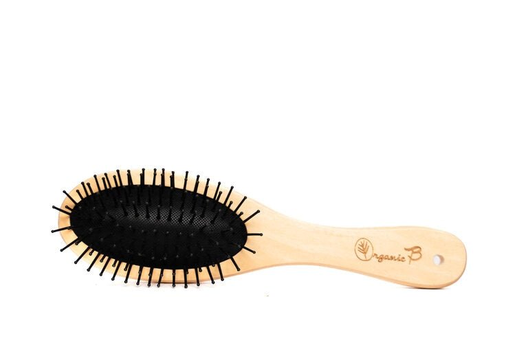 Volumonising & Anti-frizz Eco-strong Teak Paddle hairbrush | Oval, Small | Verified Sustainable Personal care on Brown Living™